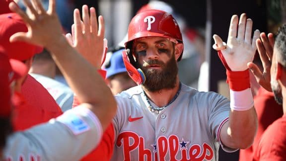 Braves advance past Phillies in wild-card clincher with late-inning surge