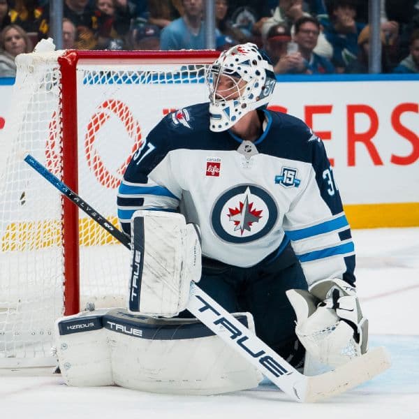 Jets suspend Hellebuyck for missing training camp